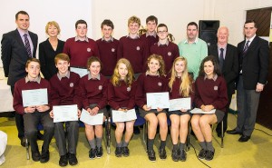 Certificates of Excellence: (Back) Kieran Foley (Guest Speaker and Journalist, Munster Express), Ms. E. Leddy (CEO, WWETB), Ross Flaherty (High Achiever in Maths and Science in Junior Cert), Josh Moore (Captain U19 Soccer Team), Callum Lyons (Captain of Senior Hurling Team), Gearoid Murphy (Bord Gais Student Theatre Award), Colm Millea (National Enterprise Award), Mr. Liam Walsh (on behalf of Darryl Walsh, member of Irish U15 Soccer squad), Mr. O. Coffey (Chairperson of BOM), Mr. E. Power (Principal). (Front) Adam O'Brien (National Enterprise Award), Craig Dunphy (National Enterprise Award), Kate Lenihan (Equestrian), Sadhbh Bolger (Equestrian), Pippi Griffin ( Bord Gais Student Theatre Award), Anna Johnson (Bord Gais Student Theatre Award), Orla Flynn (Intermediate All Ireland Camogie).