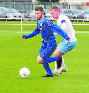 Blues striker Anthony McAlavey heads for goal