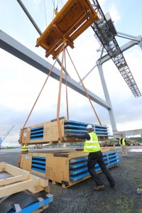 SmartPly staff handling the new equipment components.