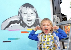 As part of the Waterford Walls Visual Street Art project one of the youngest artists, Caoilfhionn Hanton painted this version of her younger brother Alfie Hanton.