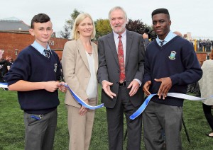 Mount Sion Secondary School Principal John McArdle cutting the ribbon with student’s Jack Byrne and Gabriel Akintunde and Ruth Beadle (Head of Supply Chain at Genzyme).