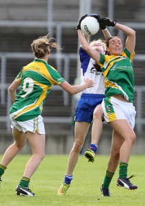 Waterford's Emma Murray battles for possession with Leitrim's Sarah McLoughlin