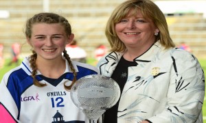 Aileen Wall is presented with the LGFA/TG4 Player of the Match by Marie Hickey