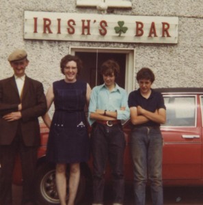 Neddy Grace pictured outside Irish's Bar in the late 1960s with the late Lizzy Irish and her sons Eamon and Phil. 