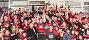 Ballygunner captain David O'Sullivan holds aloft the Waterford SHC trophy after the presentation by County Board Chairman Paddy Joe Ryan at Walsh Park on Sunday last. 