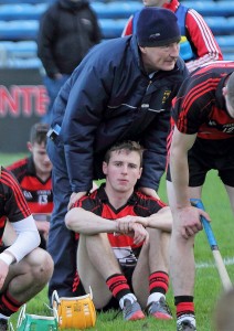 Brian O’Sullivan is consoled by his father, Tadhg following Ballygunner's Munster Senior Club Hurling Final defeat to Na Piarsaigh at Semple Stadium on Sunday