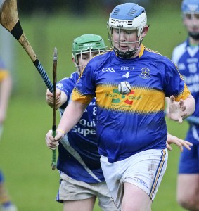 Portlaw’s Niall Phelan attempts to evade the intentions of Tramore’s Liam Goodwin. 