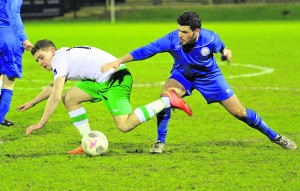 :  Blues Darren Murphy wins another vital tackle  against Cabinteely 
