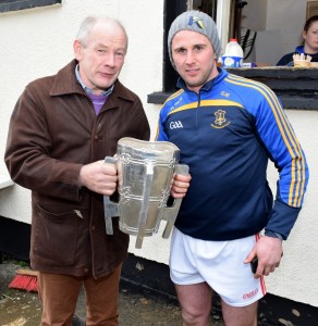Martin Gordon and Gary Morahan pose with the Liam MacCarthy Cup in Portlaw. 				| Photos: Joe Cashin 