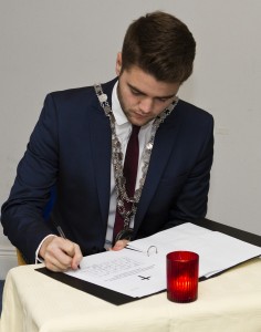 City & County Mayor Adam Wyse signing the book of condolences opened in honour of Billy McCarthy at City Hall on Monday afternoon