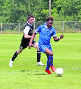 Pic1: Mike Nzongong heads goalwards against Bray at the RSC last Saturday.