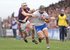 Waterford’s Maurice Shanahan tussles with Wexford’s Liam Ryan.