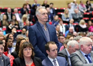 24/7 campaigner Willie Doyle waiting to ask a question at the Project Ireland 2040 event in the WIT Arena on Friday last. He didn't get to field a query to Taoiseach Leo Varadkar due to "time constraints". 						| Photo: Noel Browne 