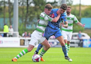 . Shamrock Rovers Ronan Finn fouling Waterford FC’s Gavan Holohan in the first half.