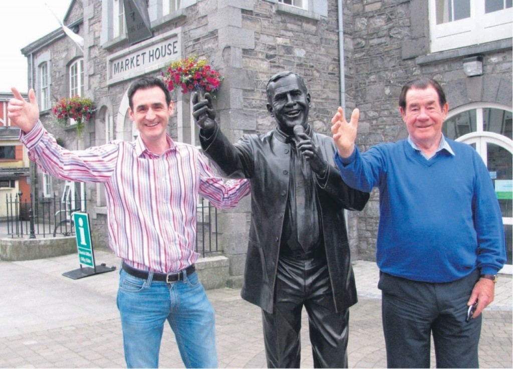  Joe Dolan's nephew, Adrian, and older brother, Ben, at the singer’s statue in Mullingar.