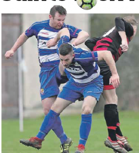 St. Joseph's Patrick Kennedy heads clear int he first half