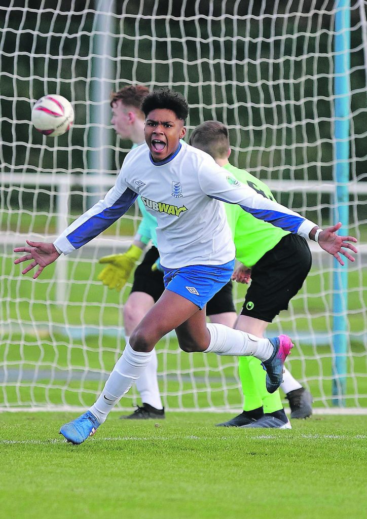 Waterford’s Tony Ebhonwaye celebrates scoring the opening goal for his side.