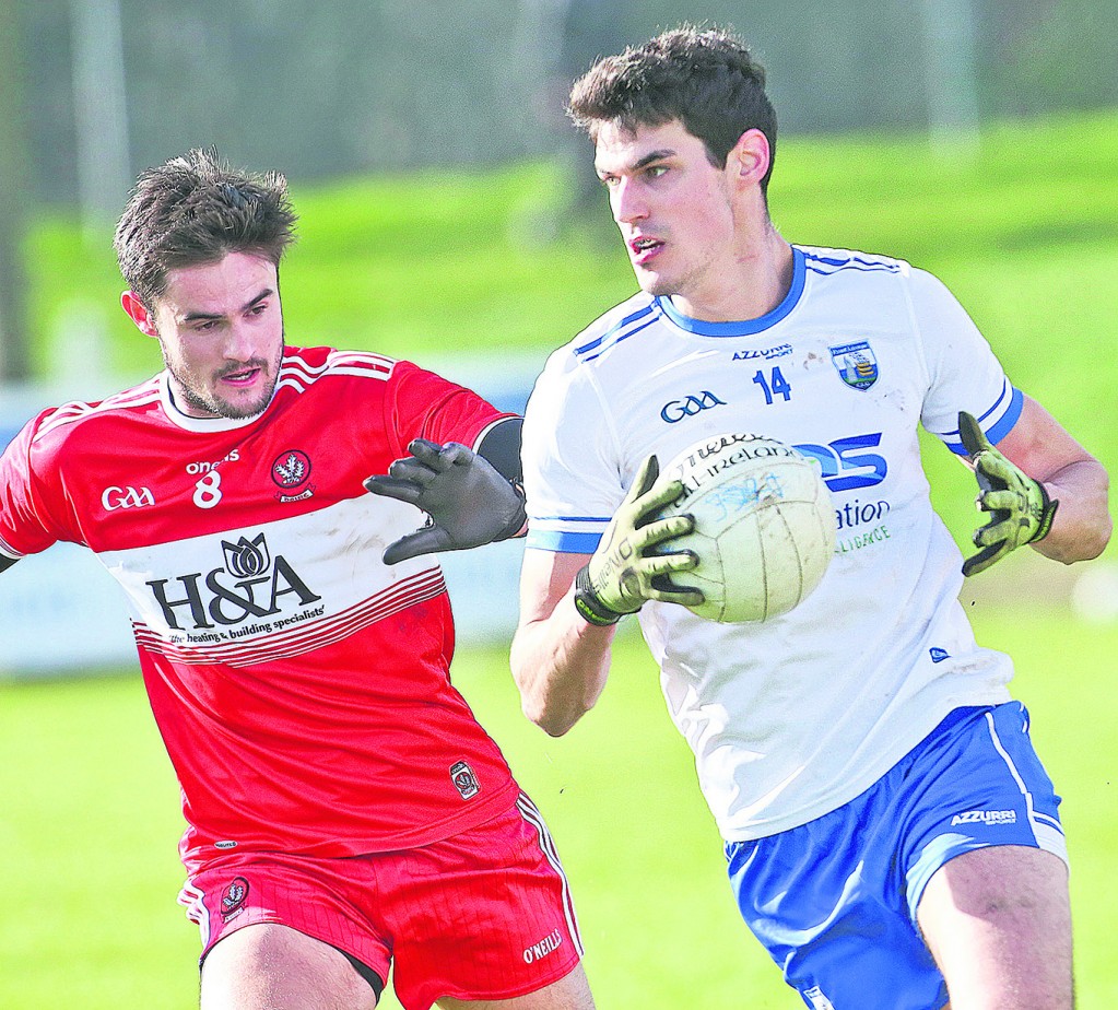 Waterford's Shane Ahearne steers away from Derry's Christopher McKaigue