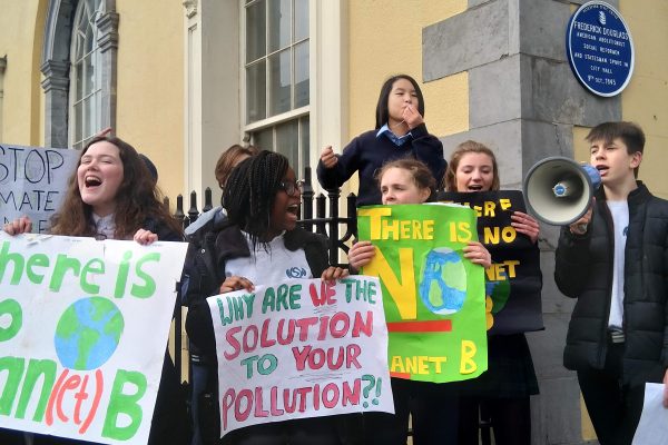 Students strike for the planet outside City Hall
