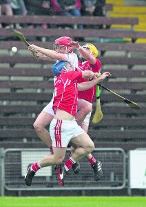 De La Salle’s Eddie Barrett is the meat in this Passage sandwich.