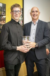 Daniel Fagan making a presentation to Mark Hennessy. 