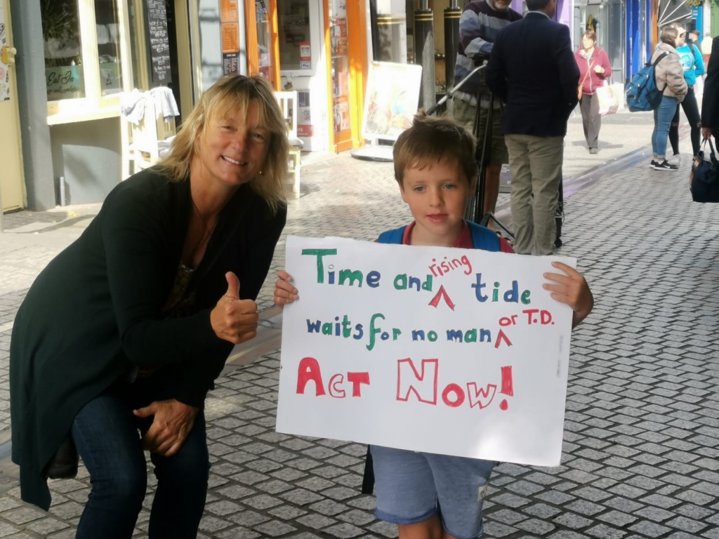 Grace O’Sullivan with a young protestor in Waterford. 