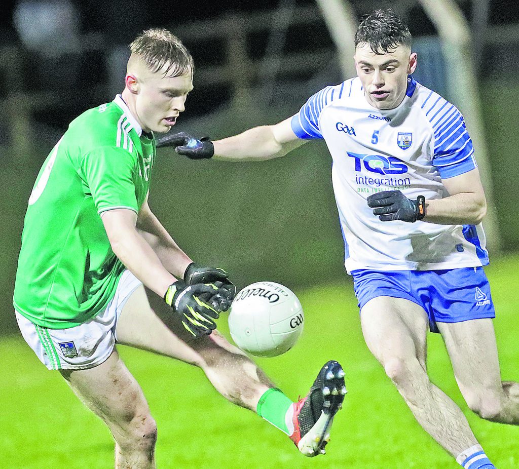 Waterford's Darragh Corcoran about to tackle Limerick's Padraig De Brun.