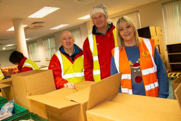 Waterford Lions Club Christmas Hamper packing at Waterford Foodbank