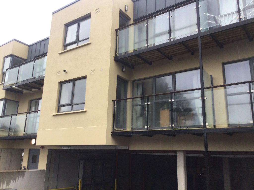 A close-up of the apartments at Mount Suir showing the glass fronted balcony.